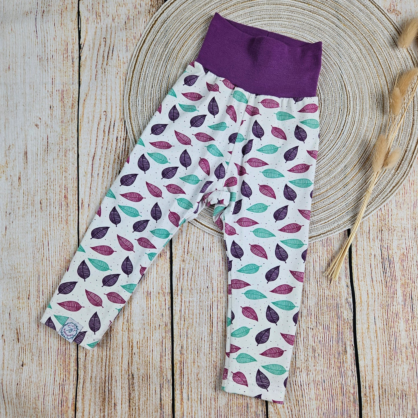 Leggings Blätter türkis/lila mit weichem Bauchbund